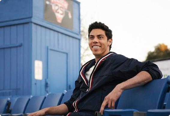 Christian Yelich sitting in a chair