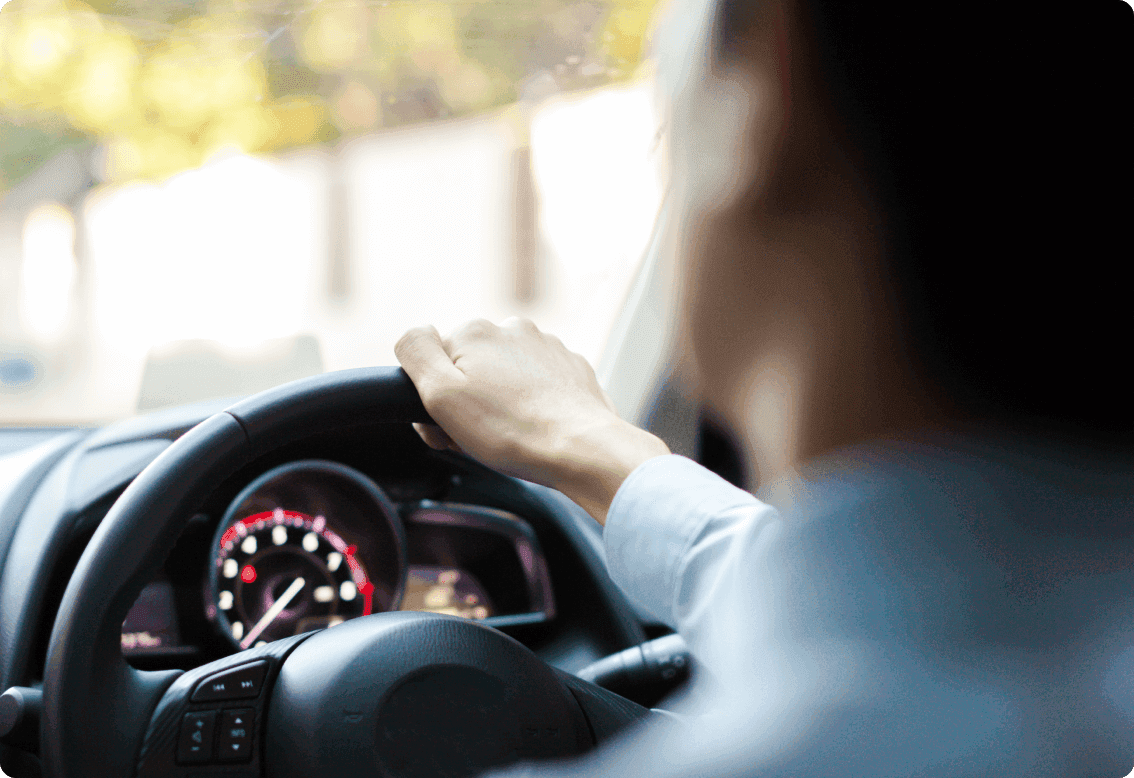 A man driving a car